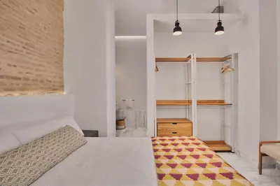 Cama o camas de una habitación en Alameda. Jesus del Gran Poder