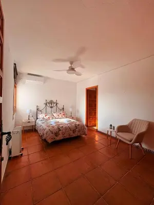 Cama o camas de una habitación en Casa rural 