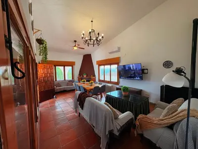Una televisión o centro de entretenimiento en Casa rural 