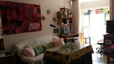 Una televisión o centro de entretenimiento en Apto Templo de Isis, Habitación Verde en Amate