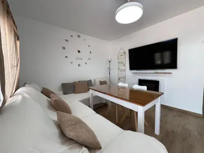 Una televisión o centro de entretenimiento en Casa las Cordobesas alojamiento rural