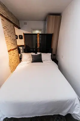 Cama o camas de una habitación en Sol de Sevilla