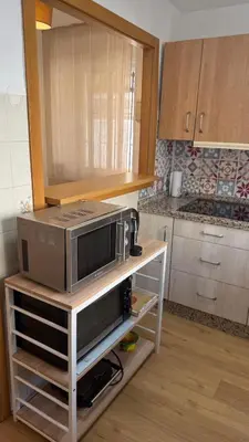 Una cocina o zona de cocina en Alojamiento turístico Puerta del Puente Romano