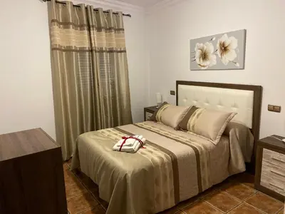 Cama o camas de una habitación en Vivienda Rural Los Tajos de Setenil