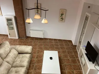 Una televisión o centro de entretenimiento en Vivienda Rural Los Tajos de Setenil