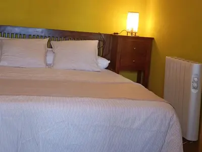 Cama o camas de una habitación en La casa de Alanís de la sierra