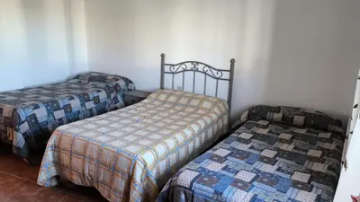Cama o camas de una habitación en Apartamento en Cazalla de la Sierra