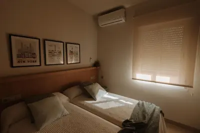 Cama o camas de una habitación en Hotel Asador Las Viñas