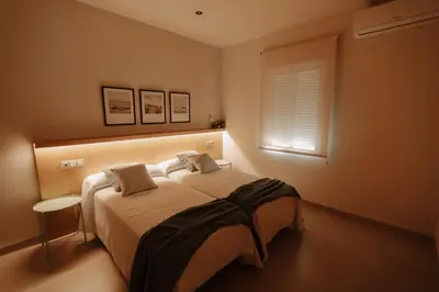 Cama o camas de una habitación en Hotel Asador Las Viñas