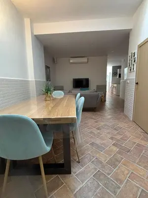 Una televisión o centro de entretenimiento en Écija Confort by Casa Yaye