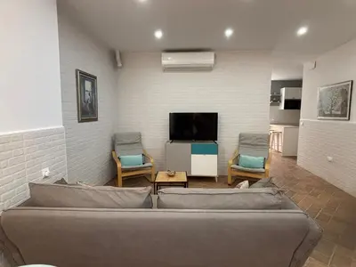 Una televisión o centro de entretenimiento en Écija Confort by Casa Yaye