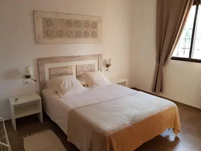 Cama o camas de una habitación en El Manantial B&B