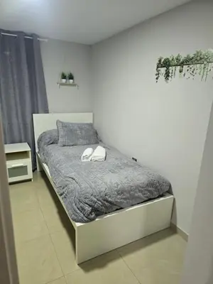 Cama o camas de una habitación en Rosa Home