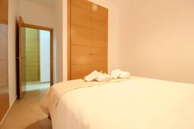Cama o camas de una habitación en Apartamento en sevilla- San julian