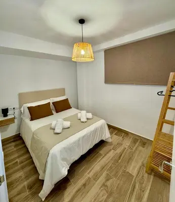 Cama o camas de una habitación en Puerta Sevilla