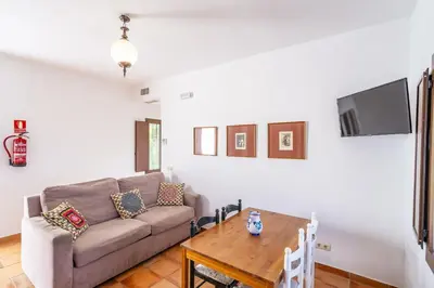 Zona de estar de Cubo's Casa Rural La Camorra Cortijo el Puntal