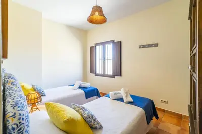 Cama o camas de una habitación en Cubo's Casa Rural La Camorra Cortijo el Puntal