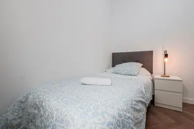 Cama o camas de una habitación en Algaba Huelva alto