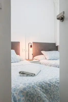 Cama o camas de una habitación en Algaba Huelva bajo