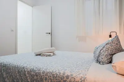 Cama o camas de una habitación en Algaba Huelva bajo