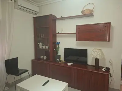 Una televisión o centro de entretenimiento en Confortable piso en Puertollano