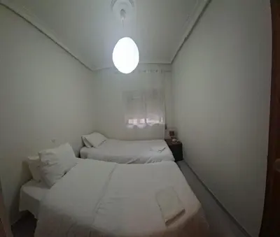 Cama o camas de una habitación en Confortable piso en Puertollano