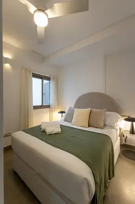 Cama o camas de una habitación en ISG Apartments Palacios Malaver 23