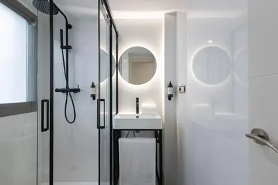 Un baño de ISG Apartments Palacios Malaver 23