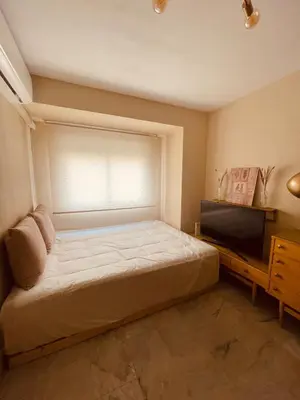 Cama o camas de una habitación en Amarilla