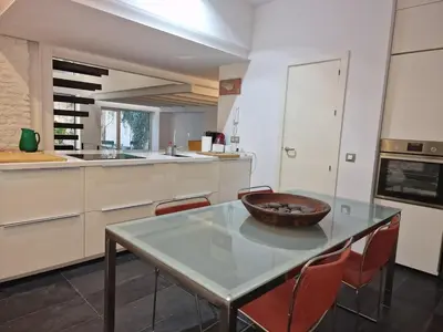 Una cocina o zona de cocina en Exclusive designer apartment with private patio Matahacas bajo