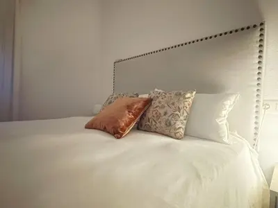 Cama o camas de una habitación en House of flowers