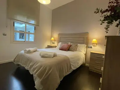 Cama o camas de una habitación en Casa de las Flores