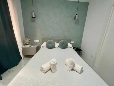 Cama o camas de una habitación en Geysotur Narcisos de Cruz Conde