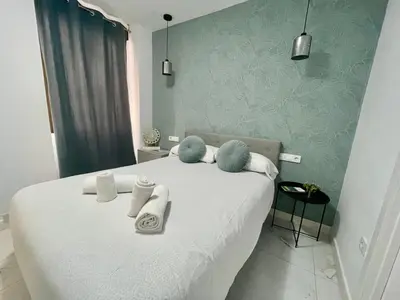 Cama o camas de una habitación en Geysotur Narcisos de Cruz Conde