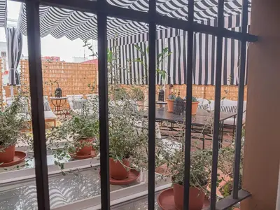 Un balcón o terraza de 10Pax Terraza minipiscina-jacuzzi Parking free