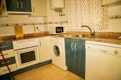 Una cocina o zona de cocina en Apartamentos Rurales Labrador
