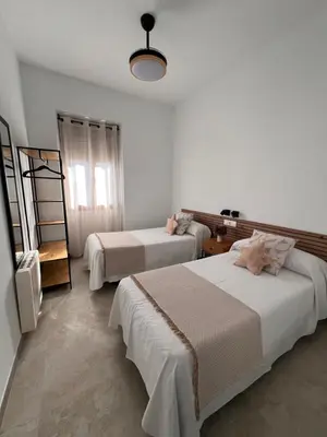 Cama o camas de una habitación en Casa Cueto