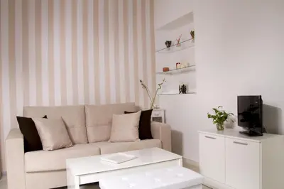 Zona de estar de Macarena Home