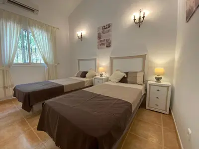 Cama o camas de una habitación en Holiday Home Villa mit Blick auf das Wasser by Interhome