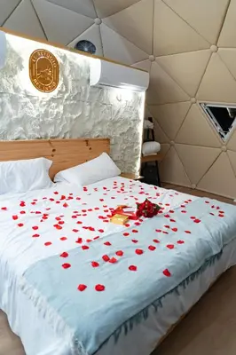 Cama o camas de una habitación en Glamping boutique bajo las estrellas