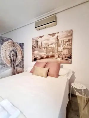 Cama o camas de una habitación en Estudio Alfalfa