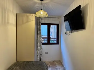 Una televisión o centro de entretenimiento en Apartamento Jardines Victoria Stay
