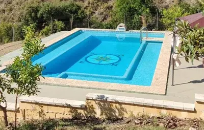 Piscina en o cerca de Casa Arroyo Precioso