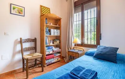 Cama o camas de una habitación en Casa Arroyo Precioso