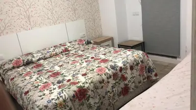 Cama o camas de una habitación en Casa Rural Herminia