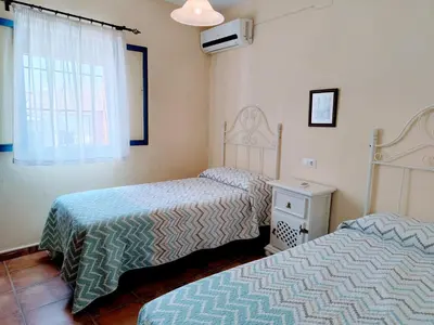 Cama o camas de una habitación en El Oasis de Castil 2