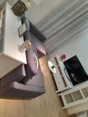Una televisión o centro de entretenimiento en Luis Montoto Acogedor