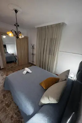 Cama o camas de una habitación en Apartamento EL LUCENTINO