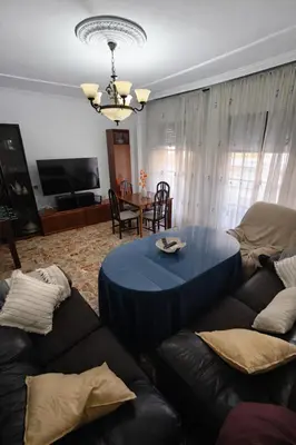 Una televisión o centro de entretenimiento en Apartamento EL LUCENTINO