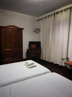 Cama o camas de una habitación en Hostal Casa Inés La Valerosa